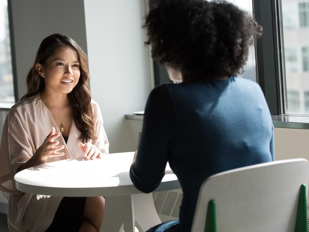 Advisor reviewing financial planning documents with clients